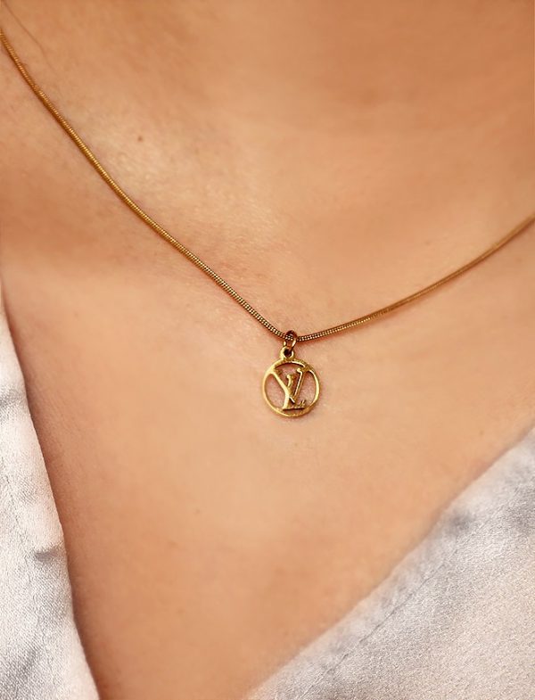 Lv necklace detail
