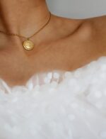Repurposed Chanel Round tag Necklace
