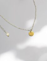 Minior Dior necklace on